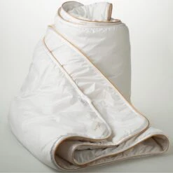 Alpaca Gold His & Hers Quilt -The Bed Rooms Shop Alpaca Gold qult rolled N11 5000x de3ee1d5 ae00 47a0 a9c6 cb6bc172810d